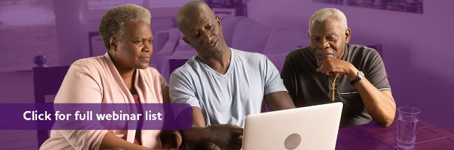 A man uses a laptop with his senior parents