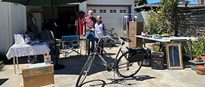 Stella and Ron at the end of their yard sale fundraiser