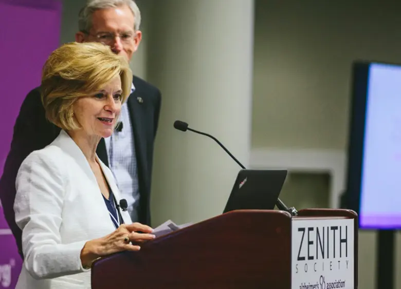 Woman speaking at podium