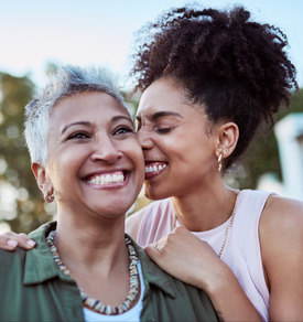 Young woman embracing her mother