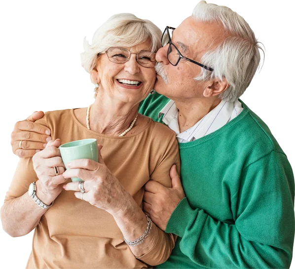 Man kissing woman on the cheek