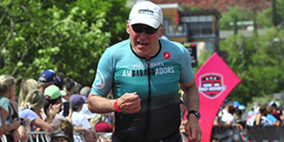 Stephen L'Heureux competes in a triathlon