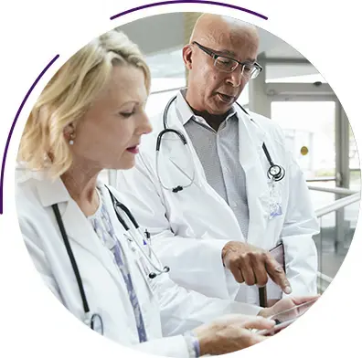 Picture of woman holding ENDALZ sign