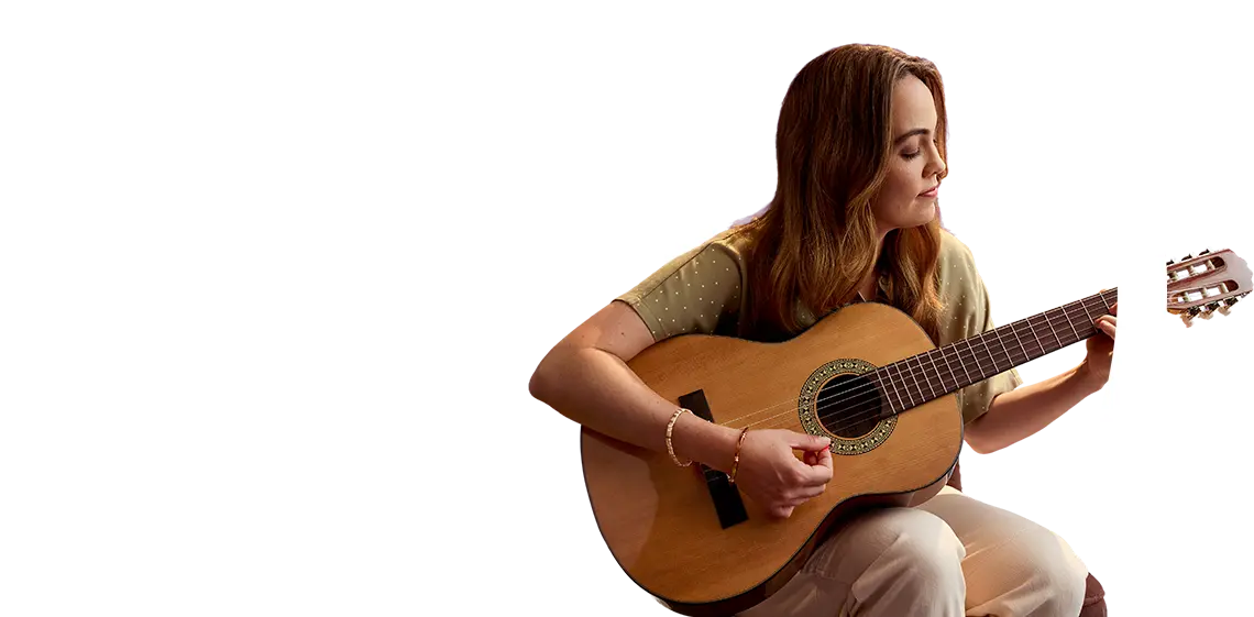 Woman playing guitar
