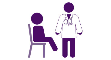 Image of a doctor providing care to patient