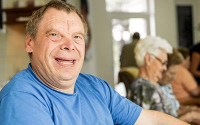 Photo of an older man who has Down syndrome